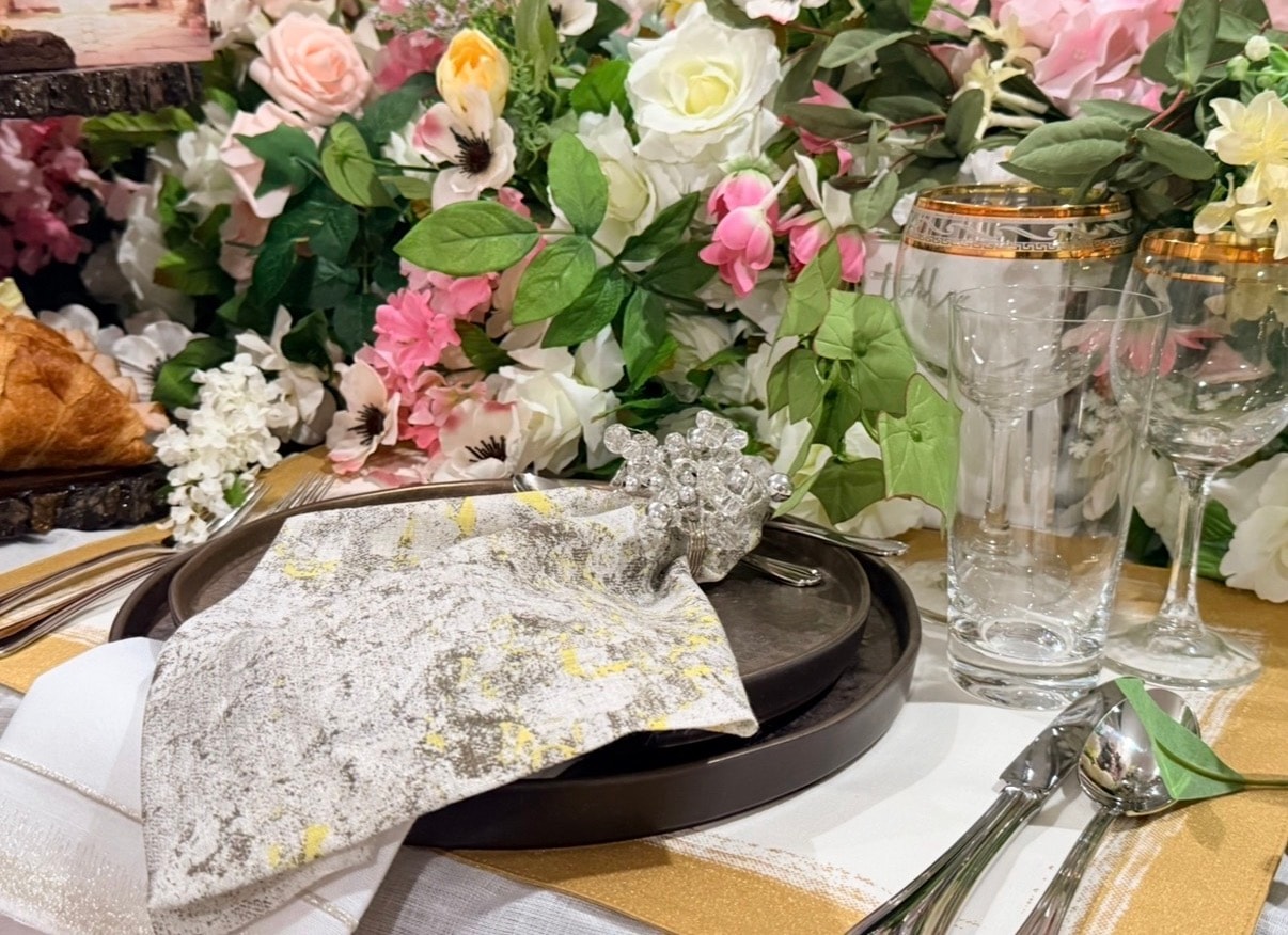 Elegant tea party tablescape with blush and gold florals